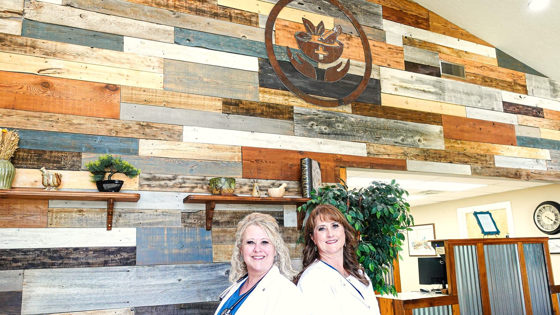 Toni Cantrell and Heidi Winder standing together in Craft Pharmacy & Clinic